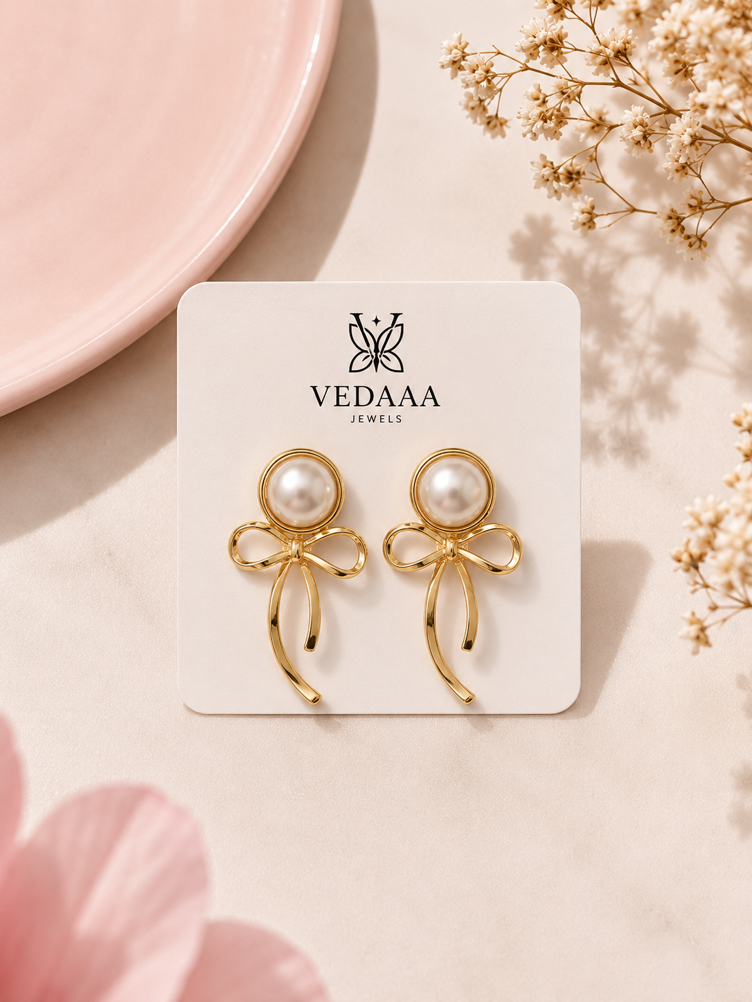 ✨ Vedaaa Pearl Bow Stud Earrings